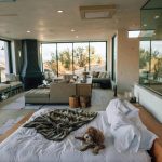 Luxurious 4BHK living room with stylish furniture, modern lighting, and an elegant ambiance.