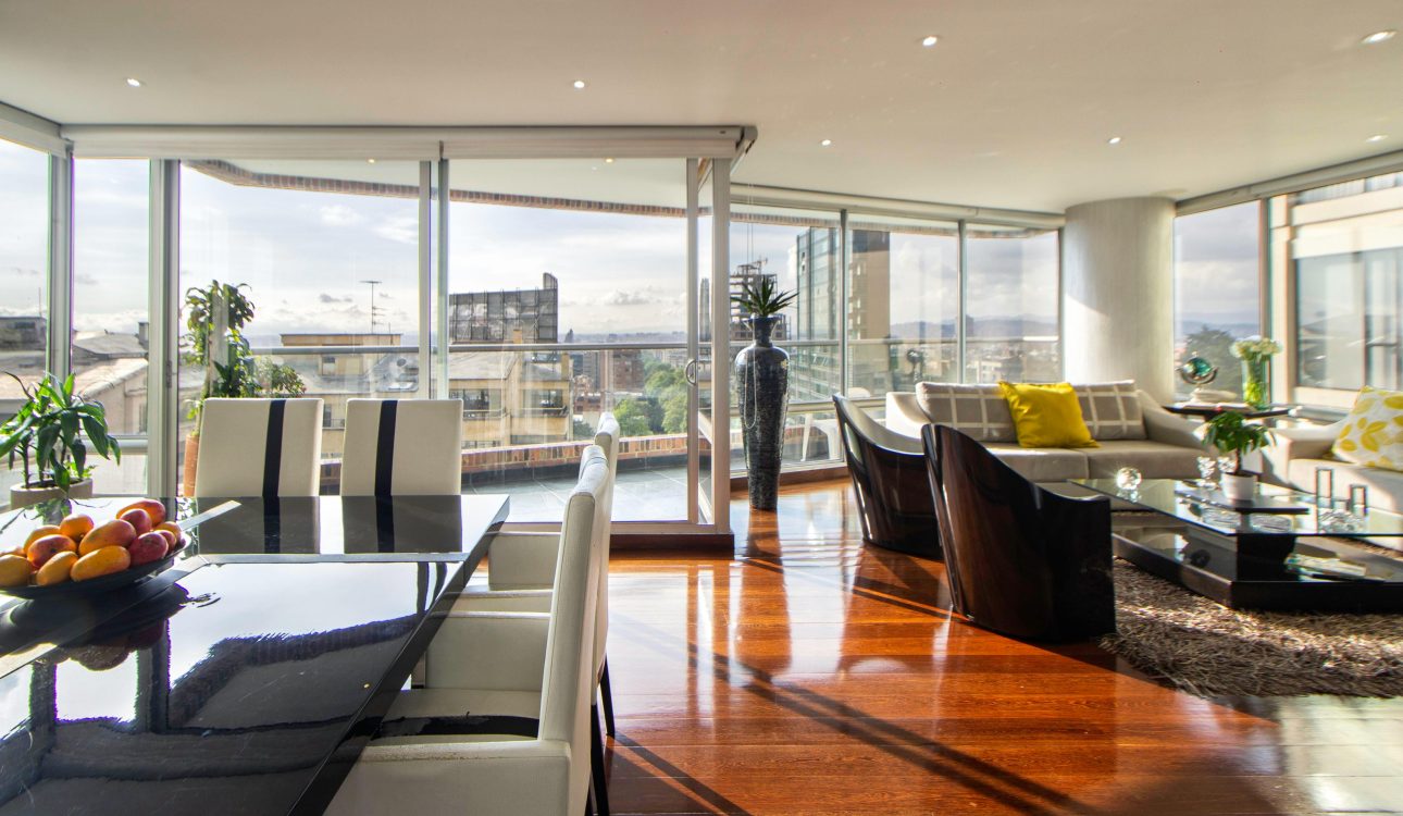 Luxury 4BHK Mumbai apartment interior with modern living and dining space.
