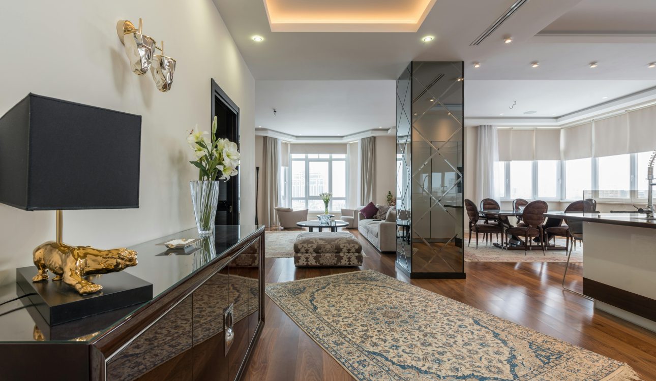 A title image displaying the text “Luxury 3BHK Flat Interior Design in Mumbai: A Perfect Blend of Elegance, Comfort & Opulence” in a bold and stylish font, set against a neutral, textured background.
