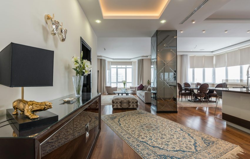 A title image displaying the text “Luxury 3BHK Flat Interior Design in Mumbai: A Perfect Blend of Elegance, Comfort & Opulence” in a bold and stylish font, set against a neutral, textured background.