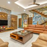 Luxury bedroom designed as per Vastu Shastra with warm colors, correct bed direction, and balanced décor