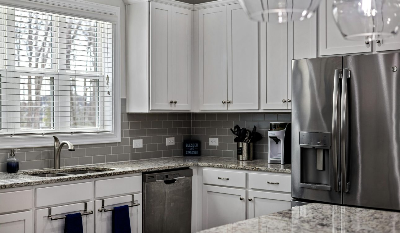 Alt Text: 4BHK luxury kitchen interior design ideas for 2025 featuring modern layouts, smart appliances, premium finishes, and elegant modular concepts for stylish living.