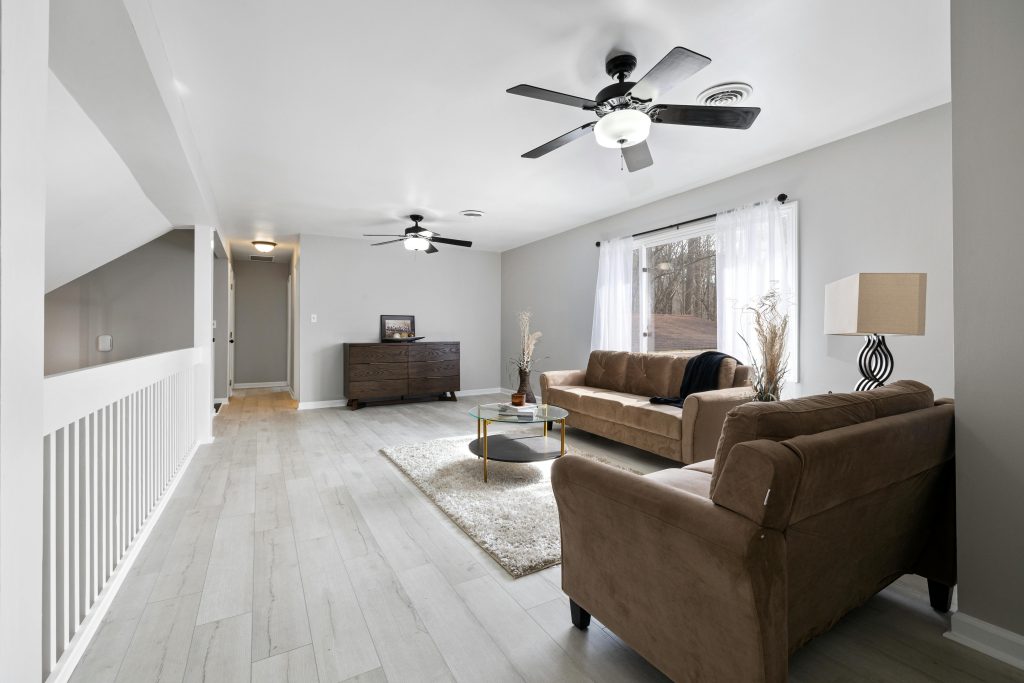 Interior design in a modern Powai apartment featuring elegant lighting, minimalist furniture, and warm textures that reflect budget-friendly sophistication.
