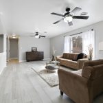 Interior design in a modern Powai apartment featuring elegant lighting, minimalist furniture, and warm textures that reflect budget-friendly sophistication.