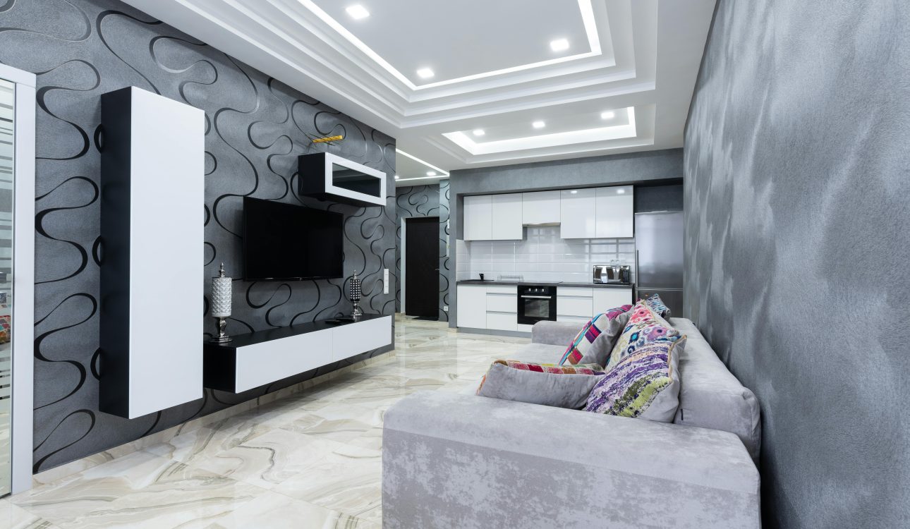 Before and after premium interior design transformation of a luxury apartment in Mumbai showing modern living room, bedroom, and kitchen makeover.