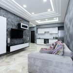 Before and after premium interior design transformation of a luxury apartment in Mumbai showing modern living room, bedroom, and kitchen makeover.