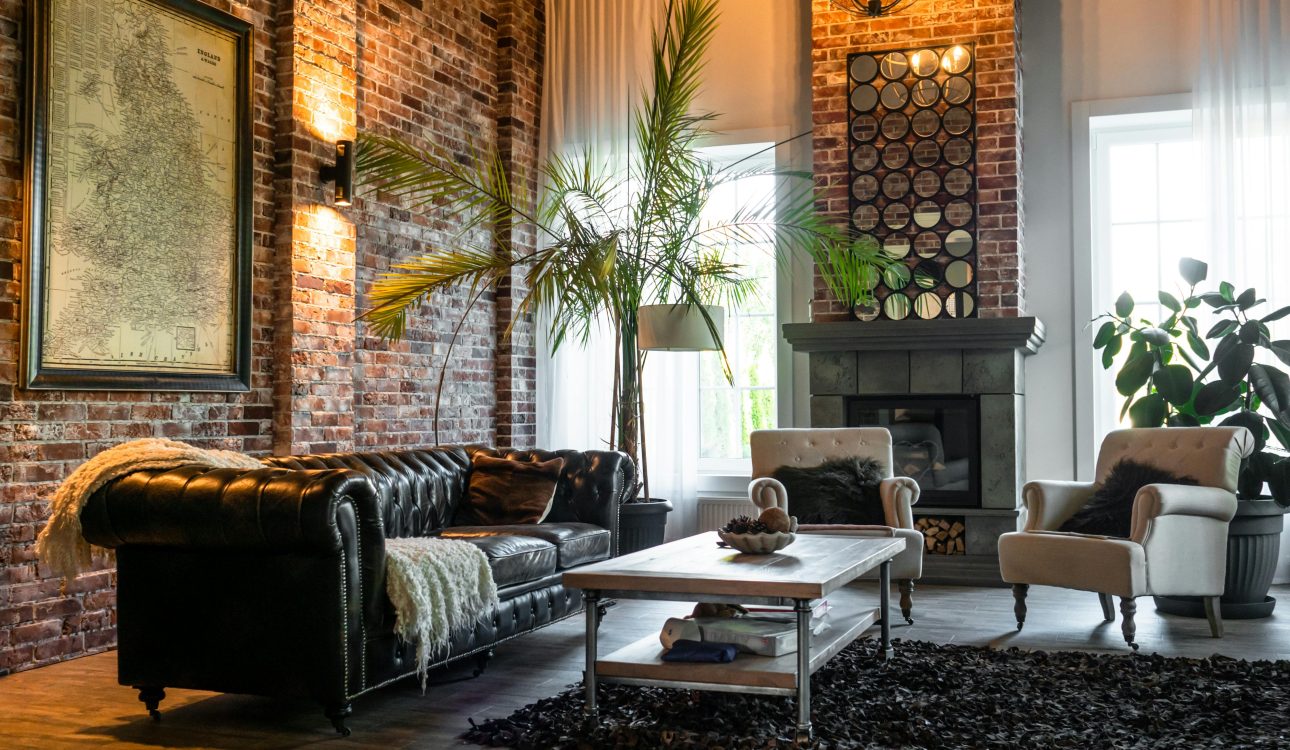 Spacious luxury living room with neutral-toned furniture, chandelier, and modern decor in a Powai apartment