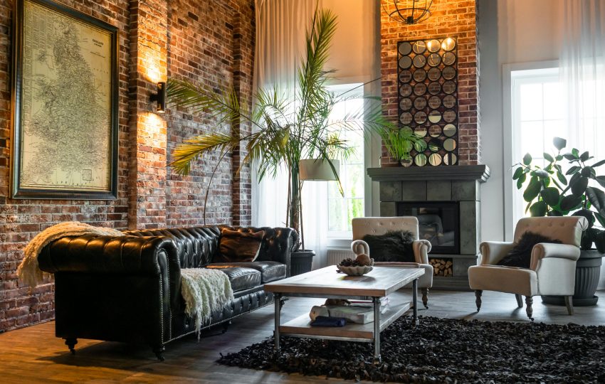 Spacious luxury living room with neutral-toned furniture, chandelier, and modern decor in a Powai apartment