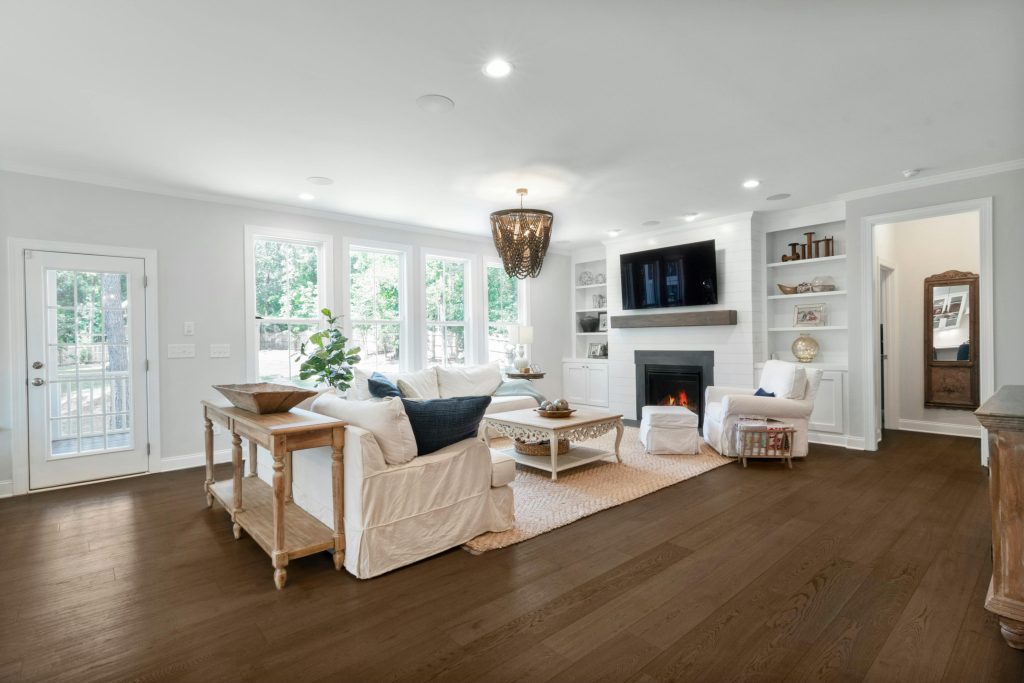 Luxury 3BHK Interior Design in Mumbai 2 Elegant luxury living room in Andheri, Mumbai with bespoke furniture, velvet textures, and sculptural lighting—2025 home decor trends.