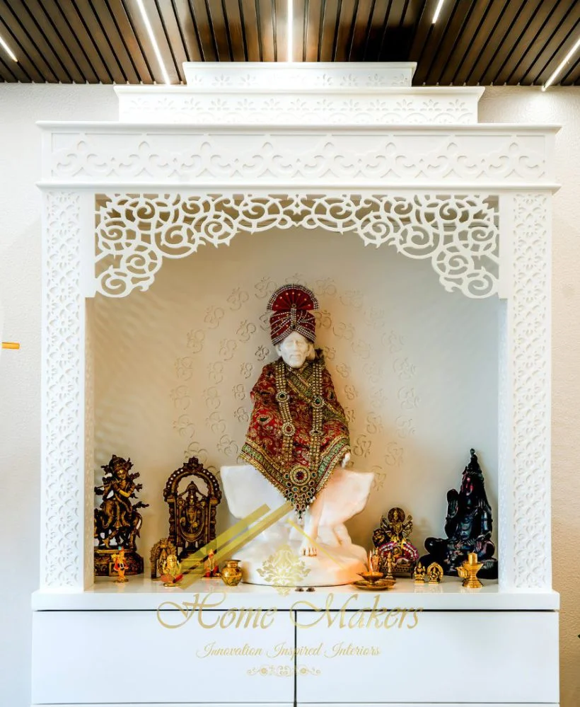 Modern pooja room interior design for 3 BHK homes in Mumbai with wooden mandir unit, marble backdrop, soft lighting, and elegant spiritual décor. 🙏✨