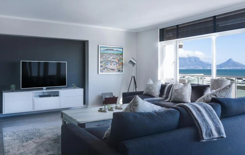 Luxury interior transformation of an empty flat into a modern elegant home in Mumbai with premium furniture, lighting, and décor.
